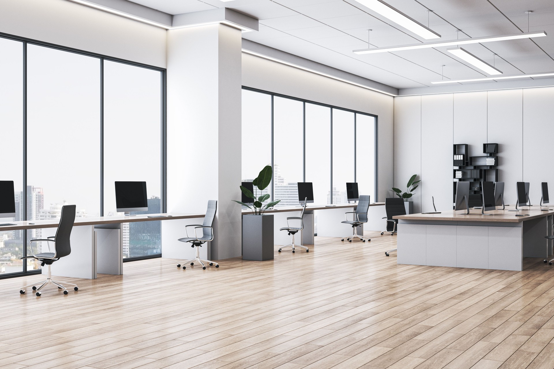 Spacious modern office interior with large windows, wooden floor, minimalist desks and computers in a bright corporate workspace setting. 3D Rendering